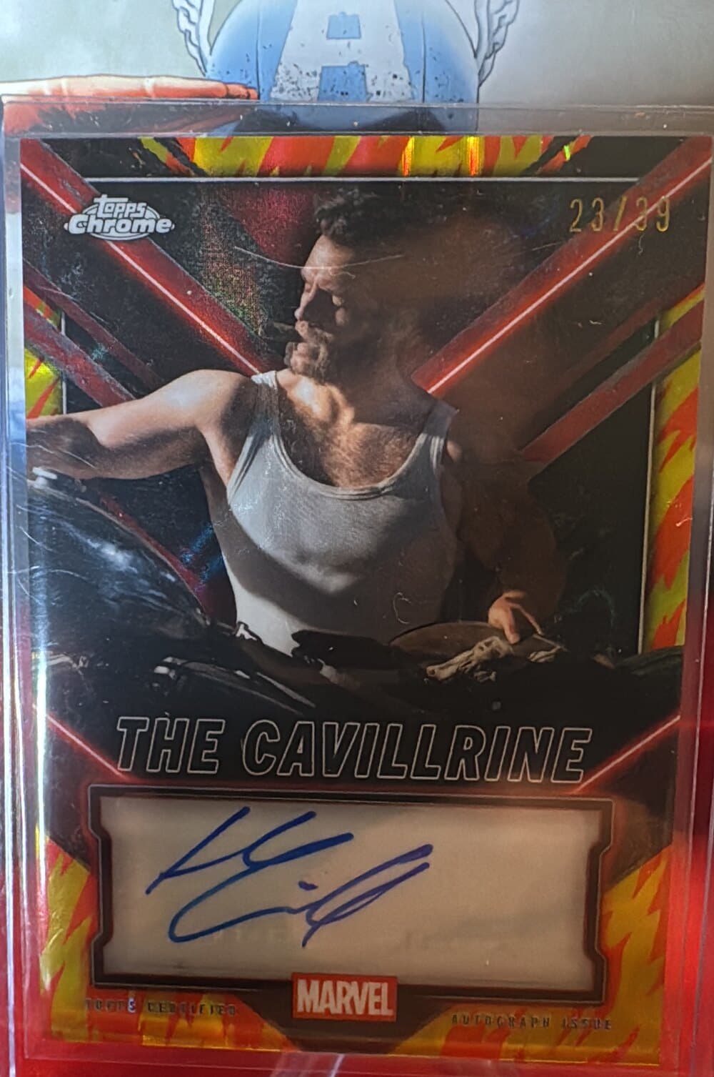 Topps Chrome Marvel 'The Cavillrine' certified autograph card numbered 23 of 39, on a flame-pattern refractor.